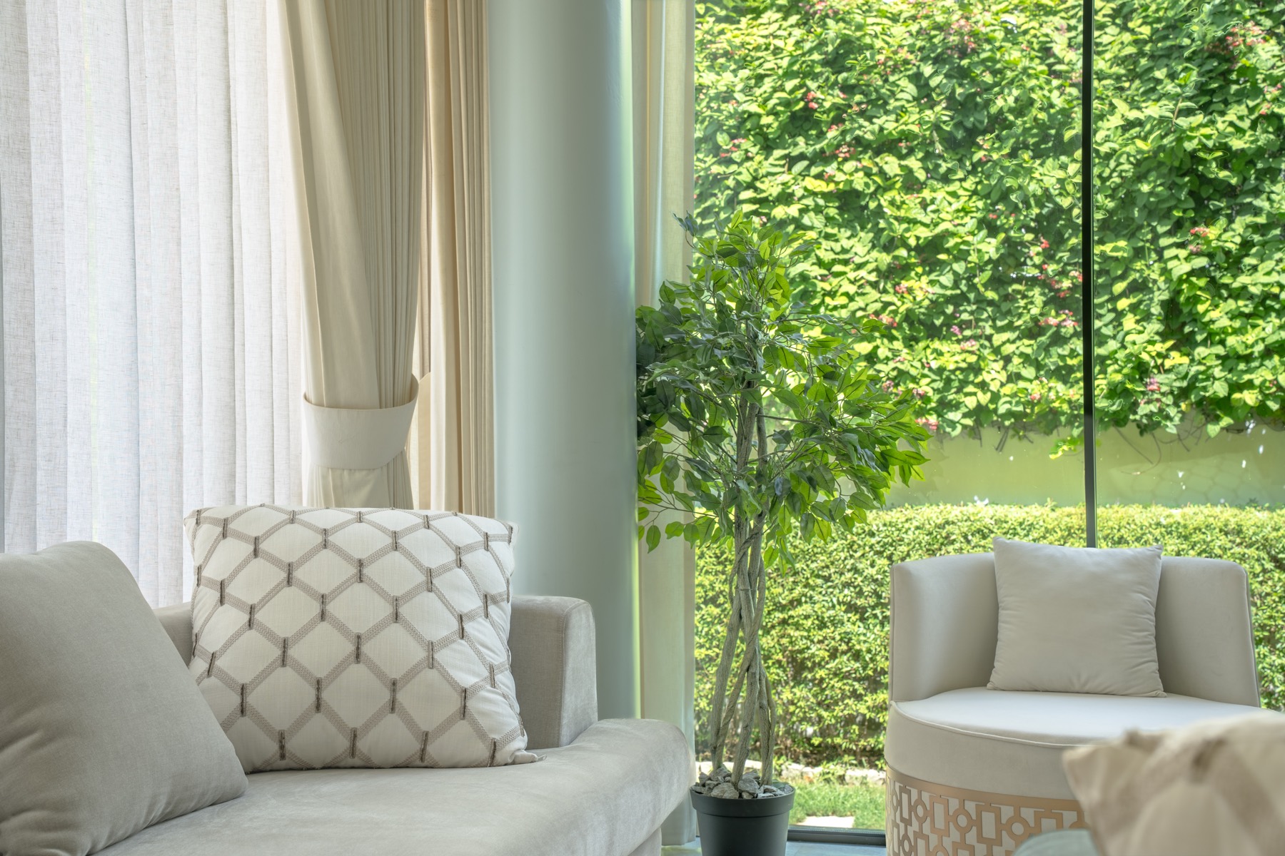 Sitting corner opening to the garden hedge, The Holiday Home